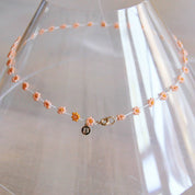 Bazou Collana con fiore di margherita in rosa salmone/arancione