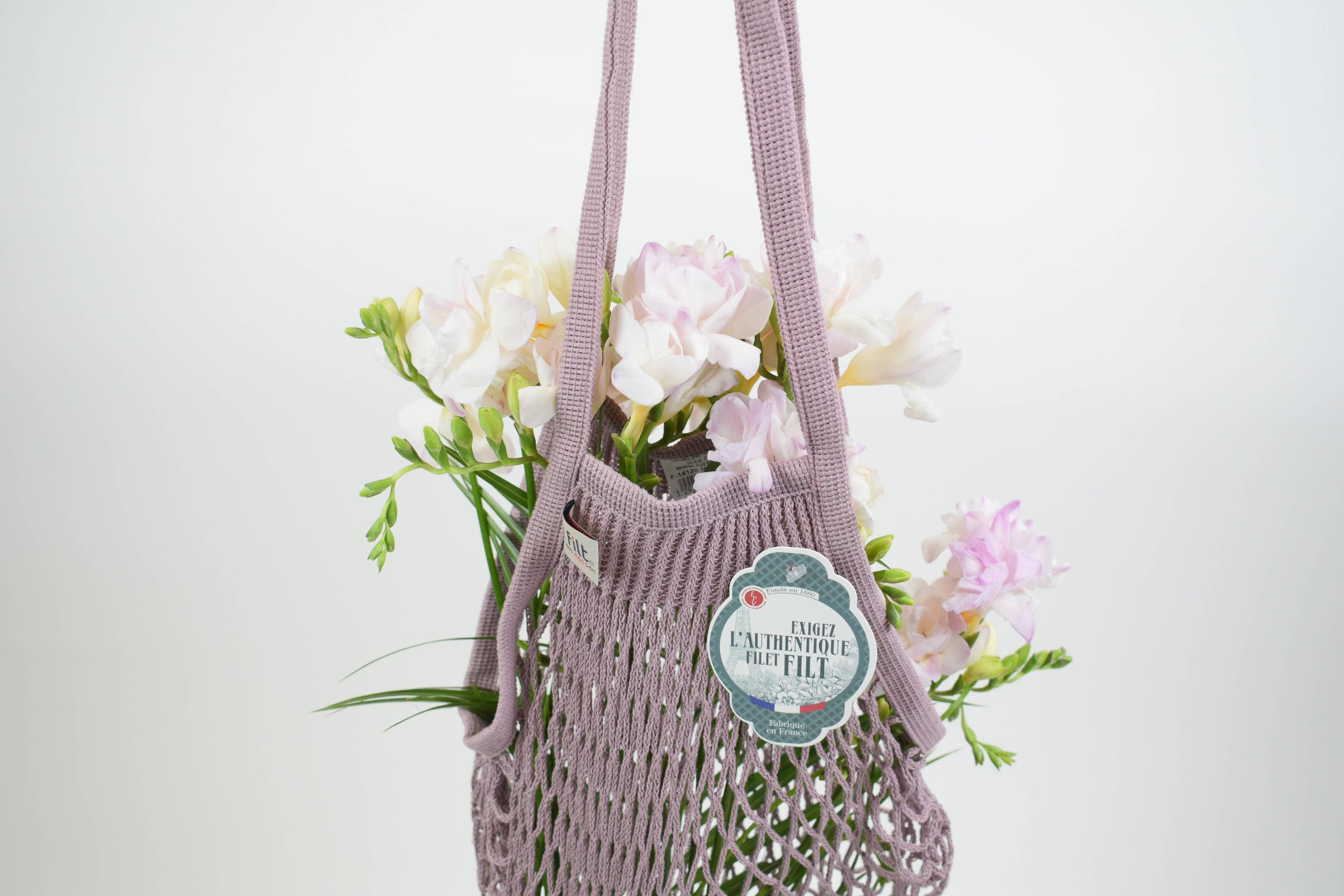 Borsa da spesa in rete rosa con manici grandi
