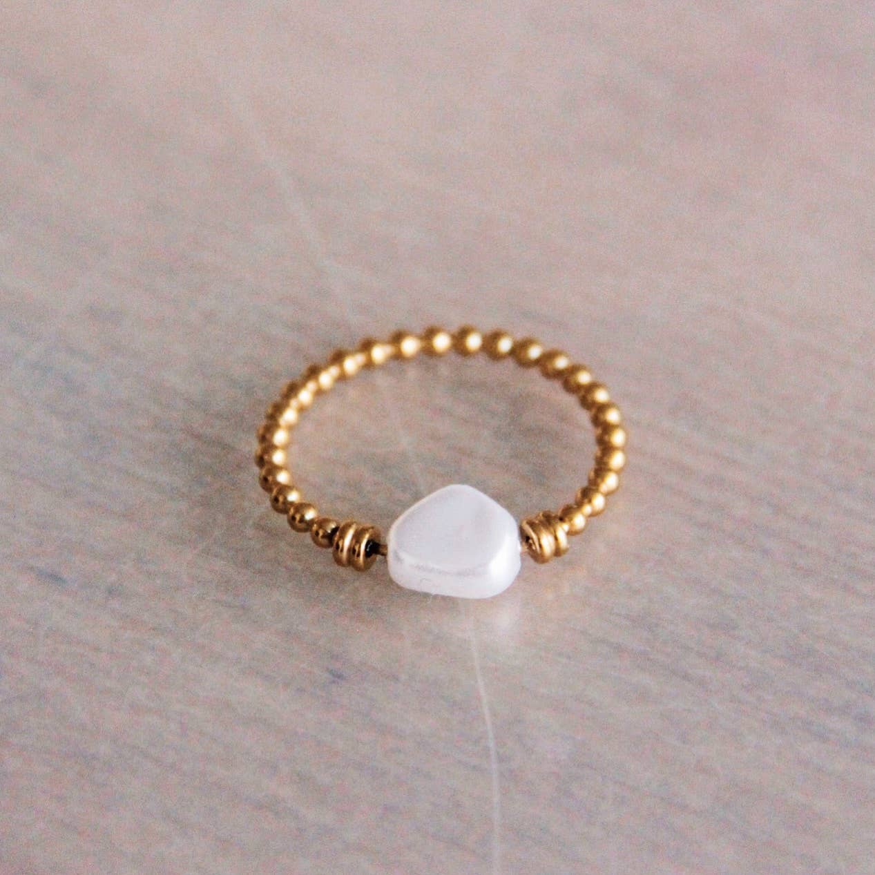 Bazou Anello a sfera in acciaio con perla - oro