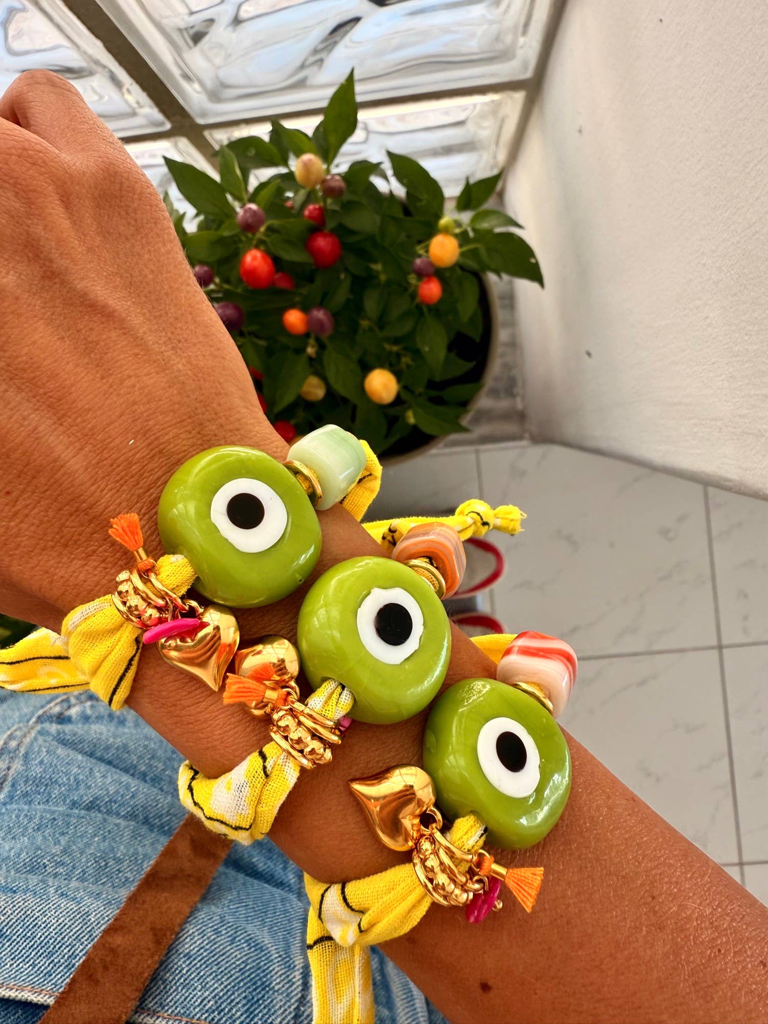 Goupi Lab Bracciale bandana giallo regolabile con occhio verde in vetro