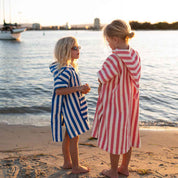 Rose in April Poncho per bambini Suzon a righe fragola