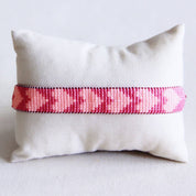 Bazou Braccialetto intrecciato con cuori - fucsia/pesca