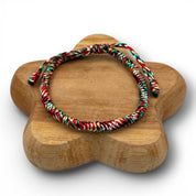 MAISON KIZO Braccialetto tibetano intrecciato - modello sottile
