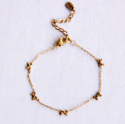 Bazou Bracciale delicato con fiocchi - oro