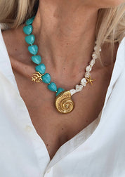 Goupi Lab Collana conchiglia dorata e pietre semipreziose con pendente a nautilus o palma: Bianco sporco / Grande conchiglia dorata