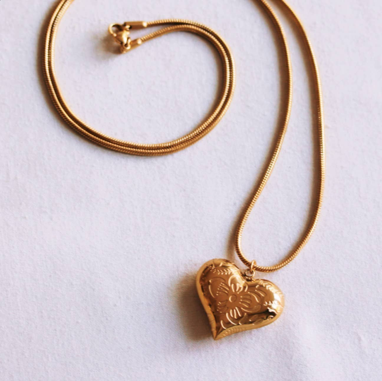 Bazou Lunga collana a serpente con cuore sferico