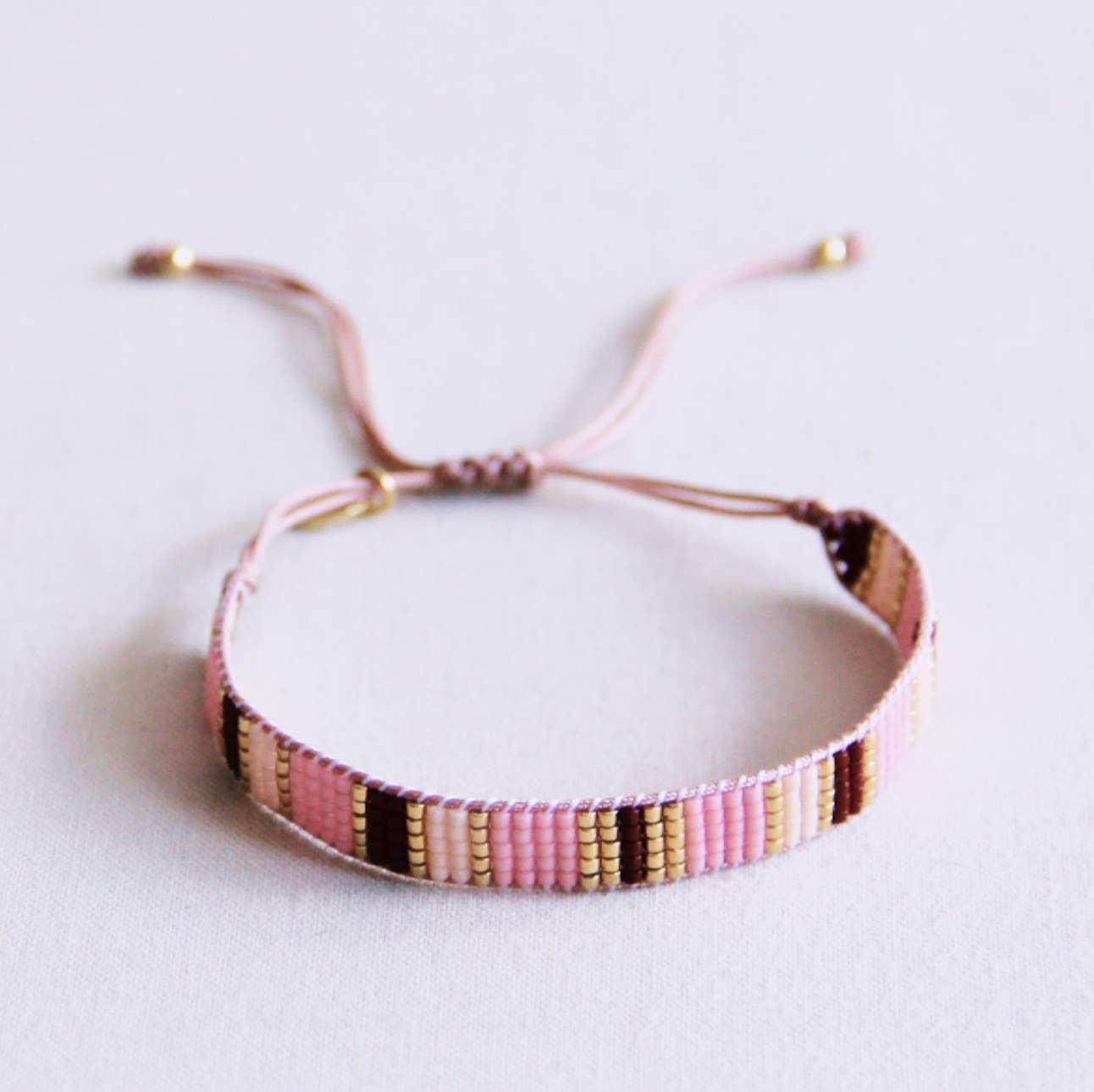 Bazou Braccialetto intrecciato a righe - nudo/rosa/marrone