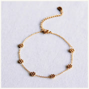 Bazou Cavigliera fine con margherite – oro