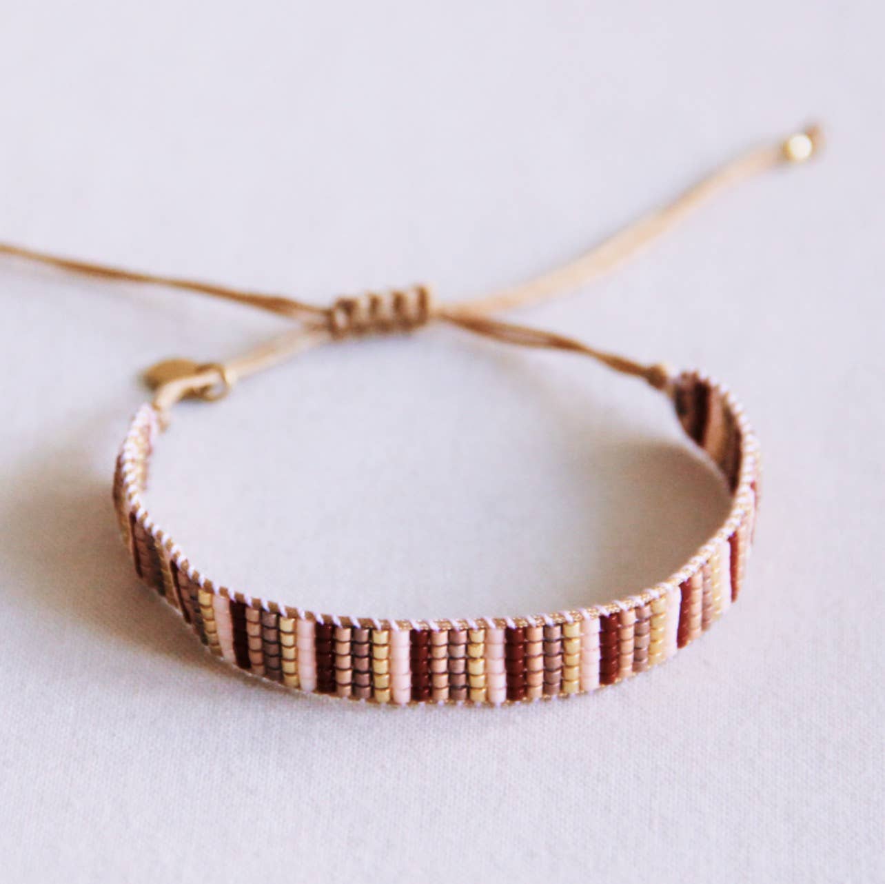 Bazou Bracciale intrecciato 'stripes' - tonalità nude