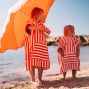 Rose in April Poncho per bambini Suzon a righe fragola