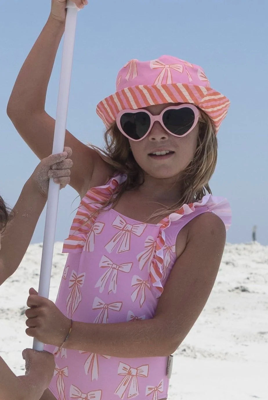 Paper Boat Cappello a secchiello a righe e fiocchi da spiaggia