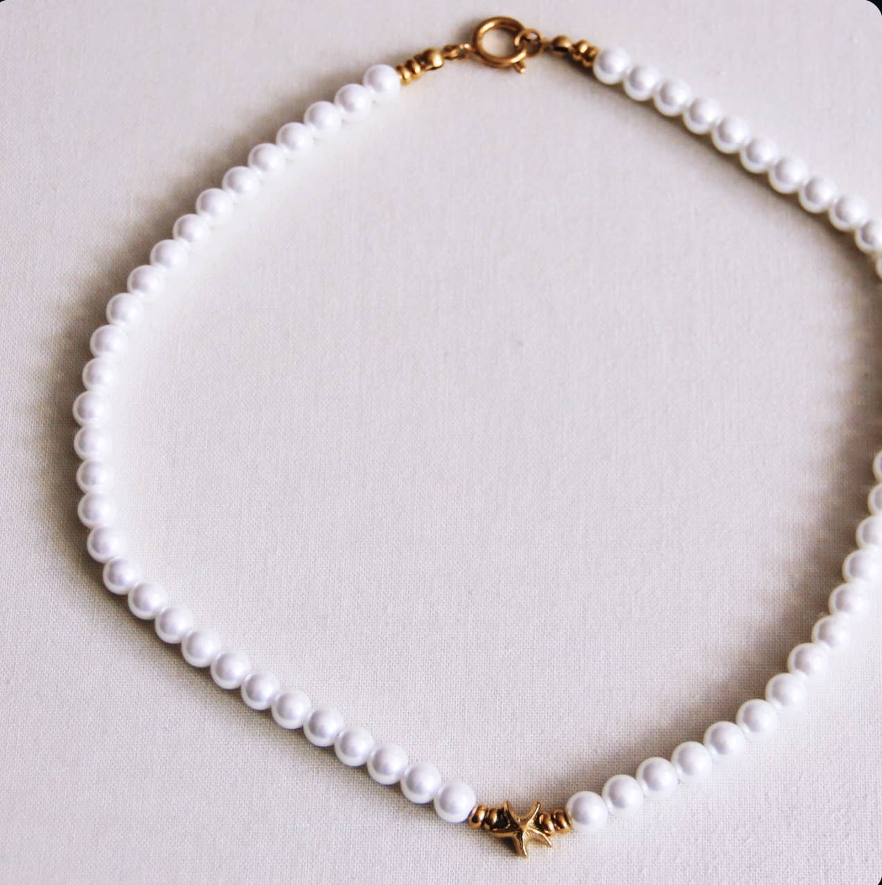 Bazou Collana di perle con mini stelle marine