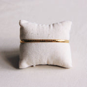Bazou Bracciale piatto in acciaio a righe - oro