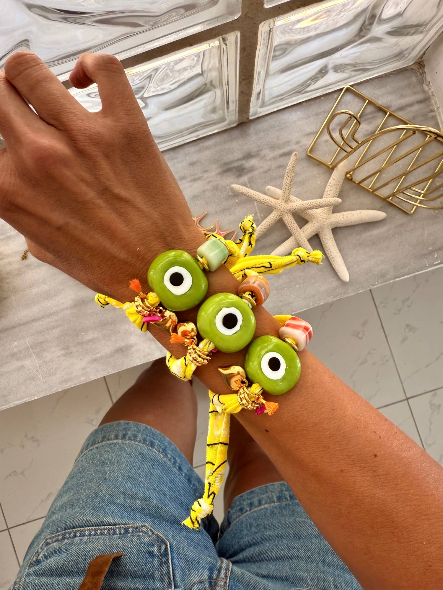 Goupi Lab Bracciale bandana giallo regolabile con occhio verde in vetro