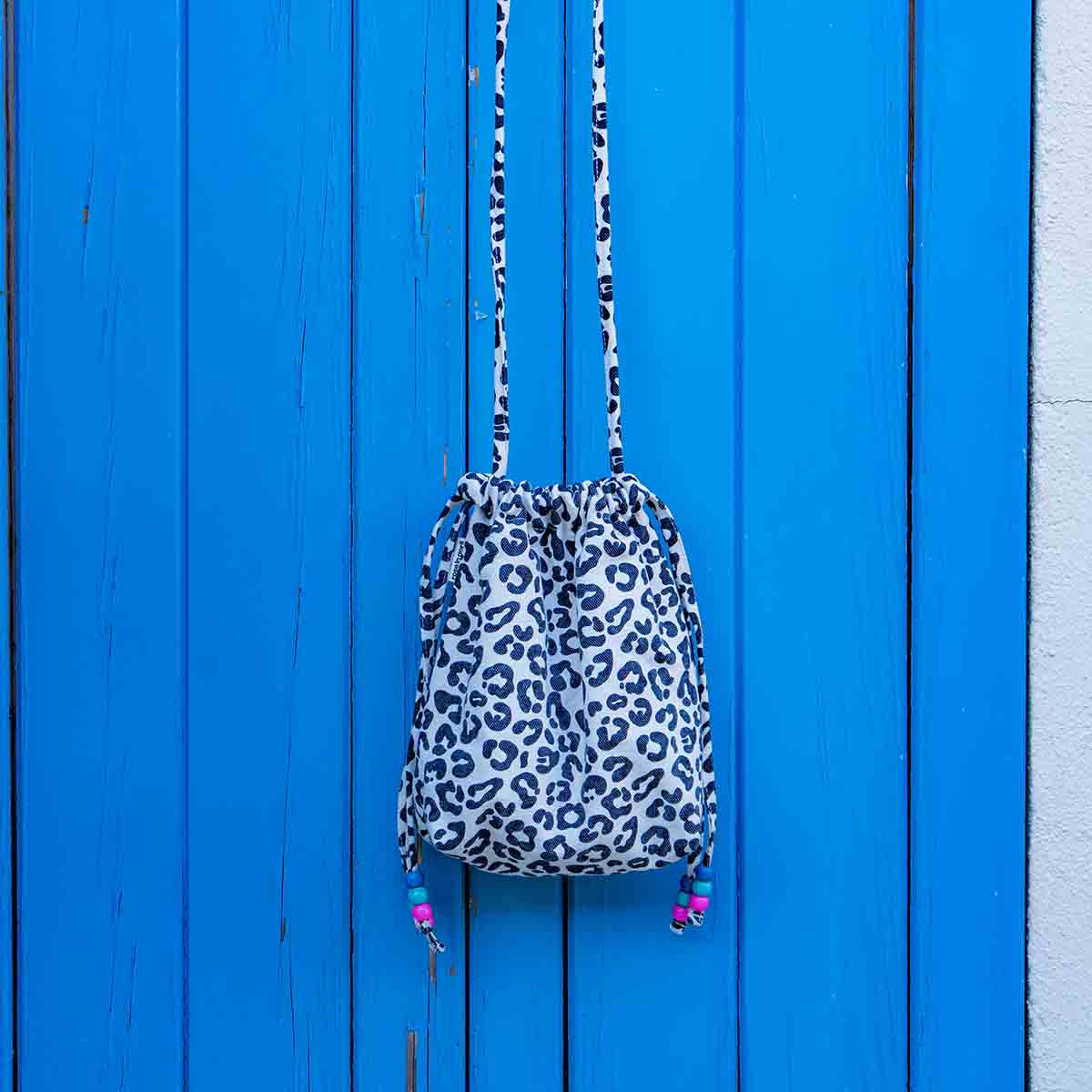 Rose in April Borsa Paloma Graou Greige con stampa leopardata e perline multicolori