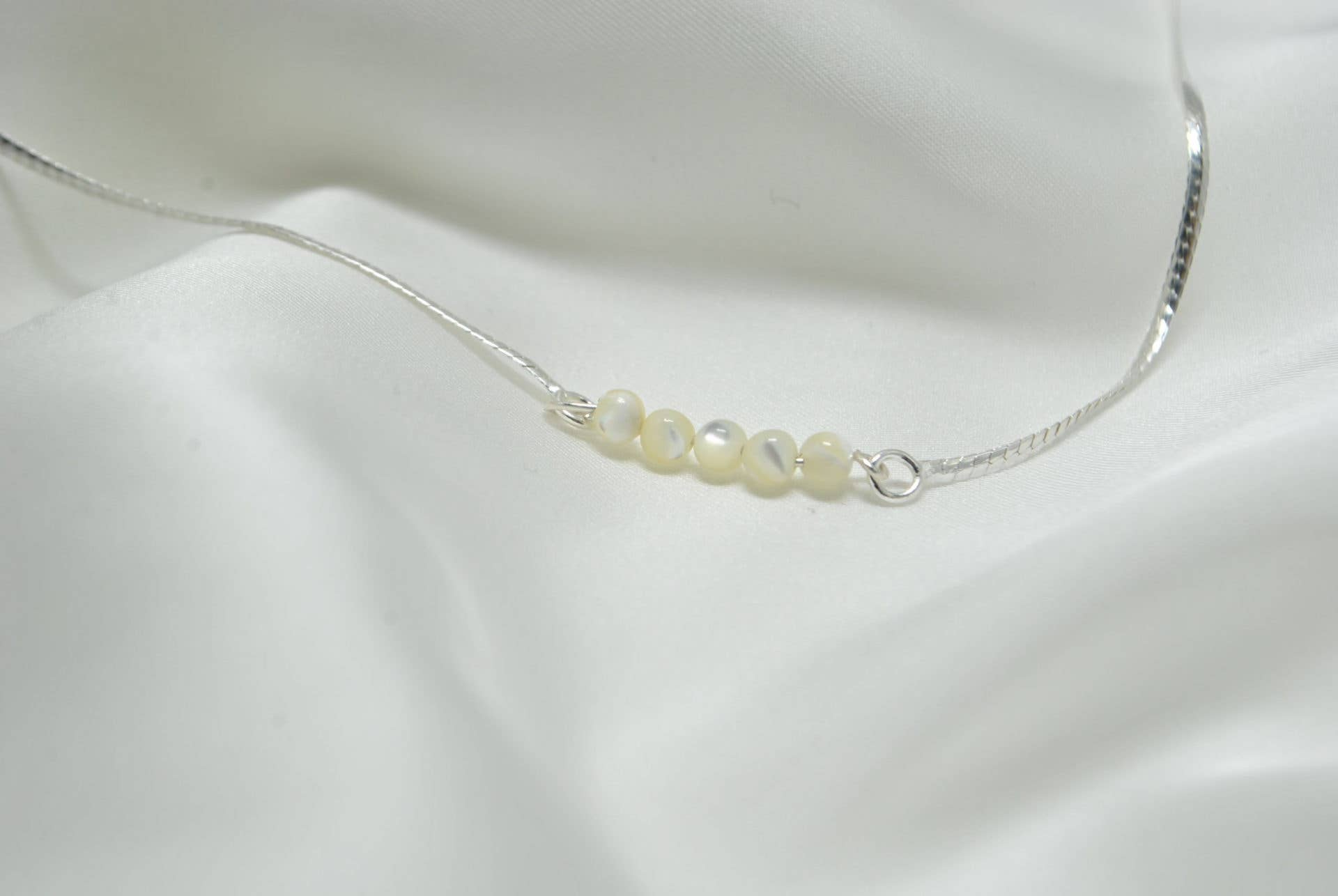 Iroquoise Cavigliera in madreperla e argento 925