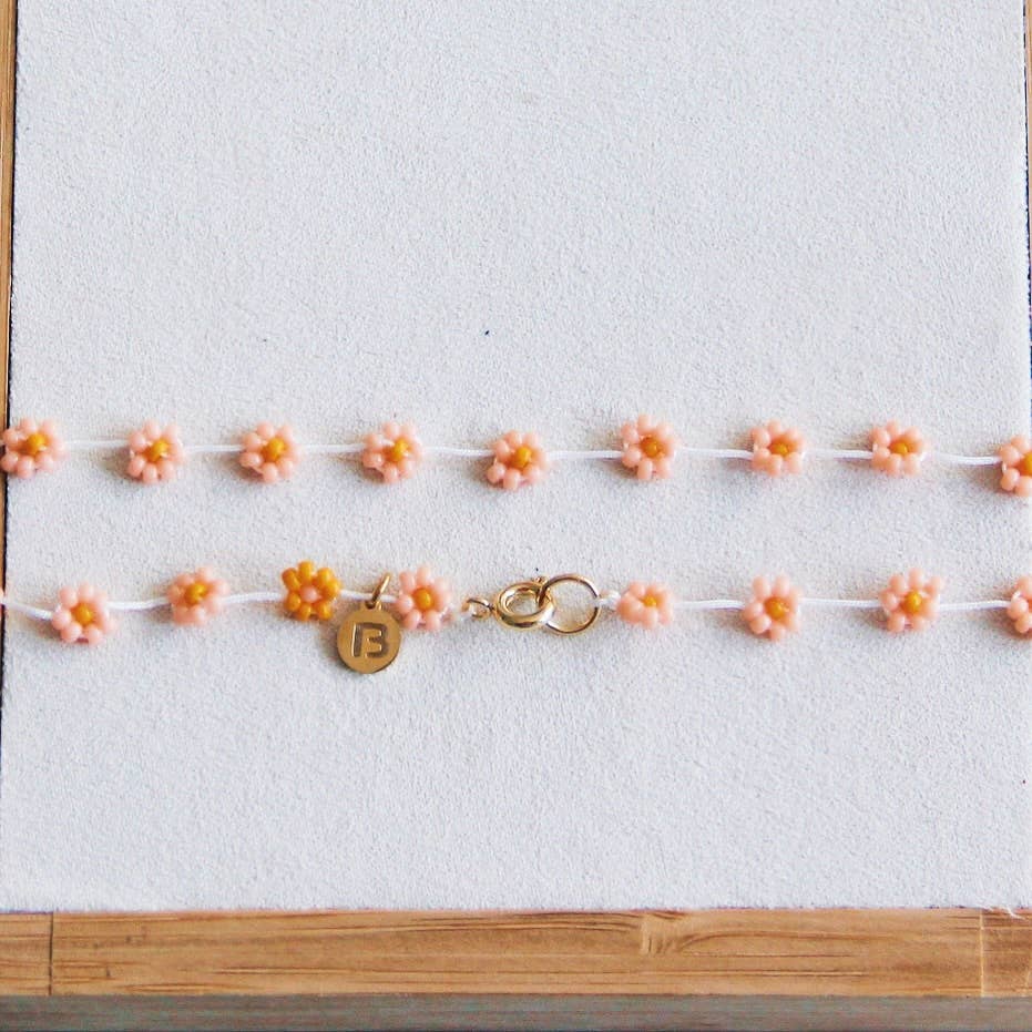 Bazou Collana con fiore di margherita in rosa salmone/arancione