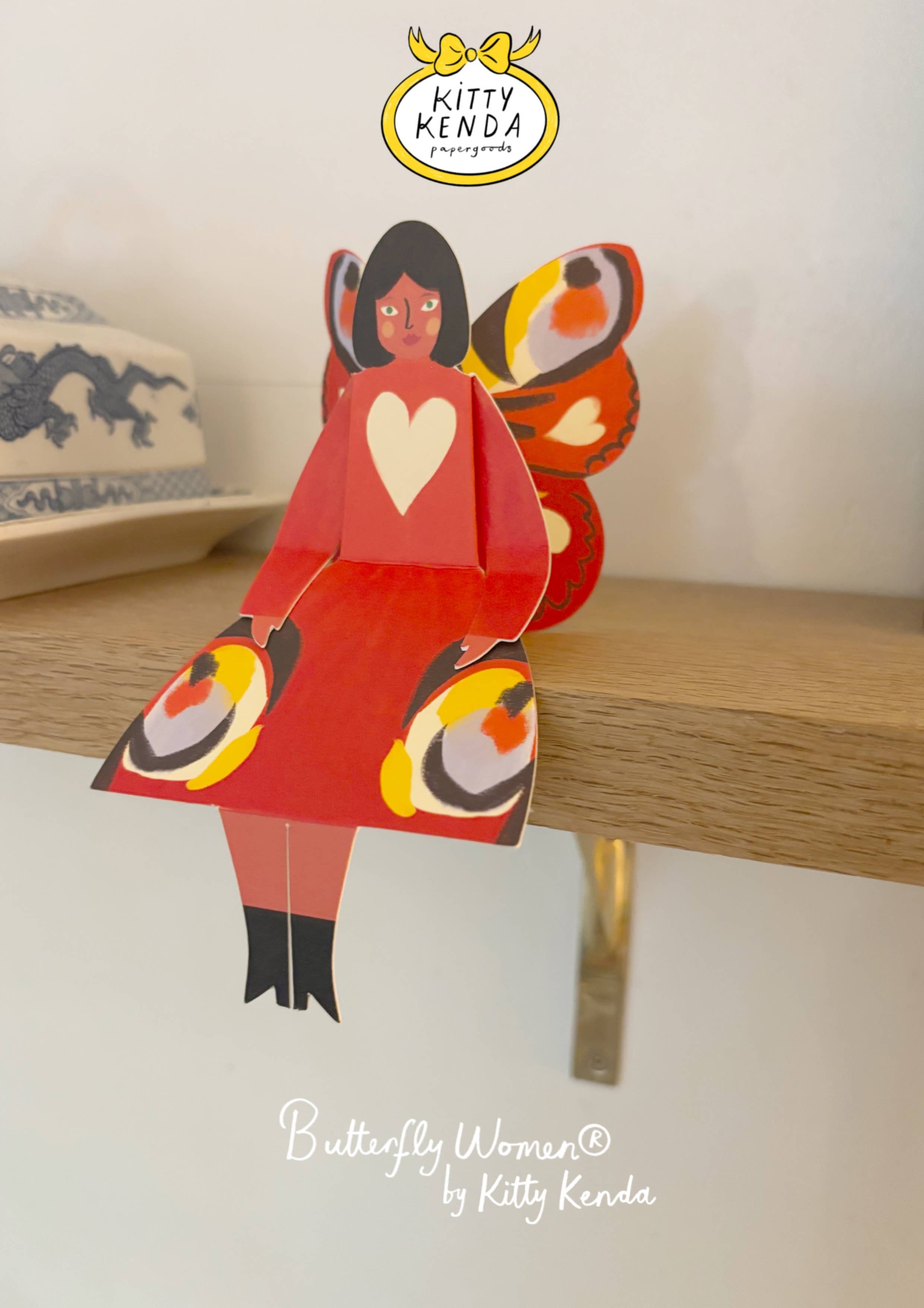 Kitty Kenda Papergoods Biglietto di Auguri Donna Farfalla Seduta - Pavone