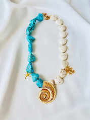 Goupi Lab Collana conchiglia dorata e pietre semipreziose con pendente a nautilus o palma: Bianco sporco / Grande conchiglia dorata